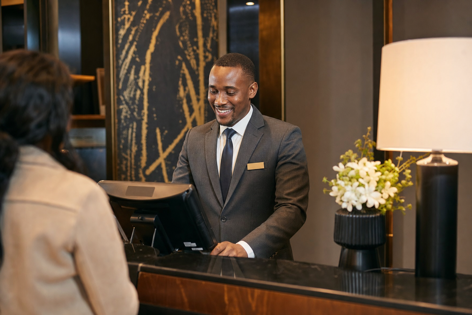 Concierge and finance staff coordinating guest billing